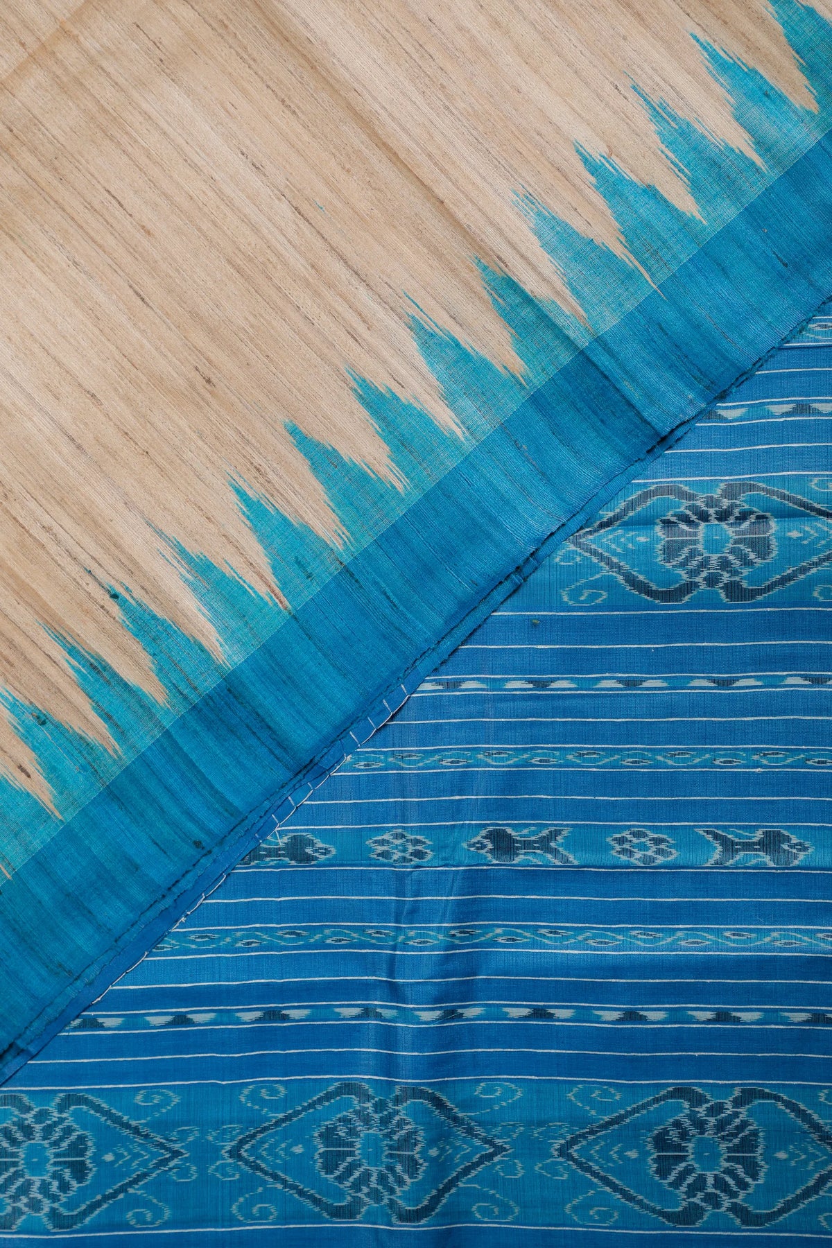 Beige Orissa Ikkat Tussar Pure Silk Handloom Saree with Blue Temple Border