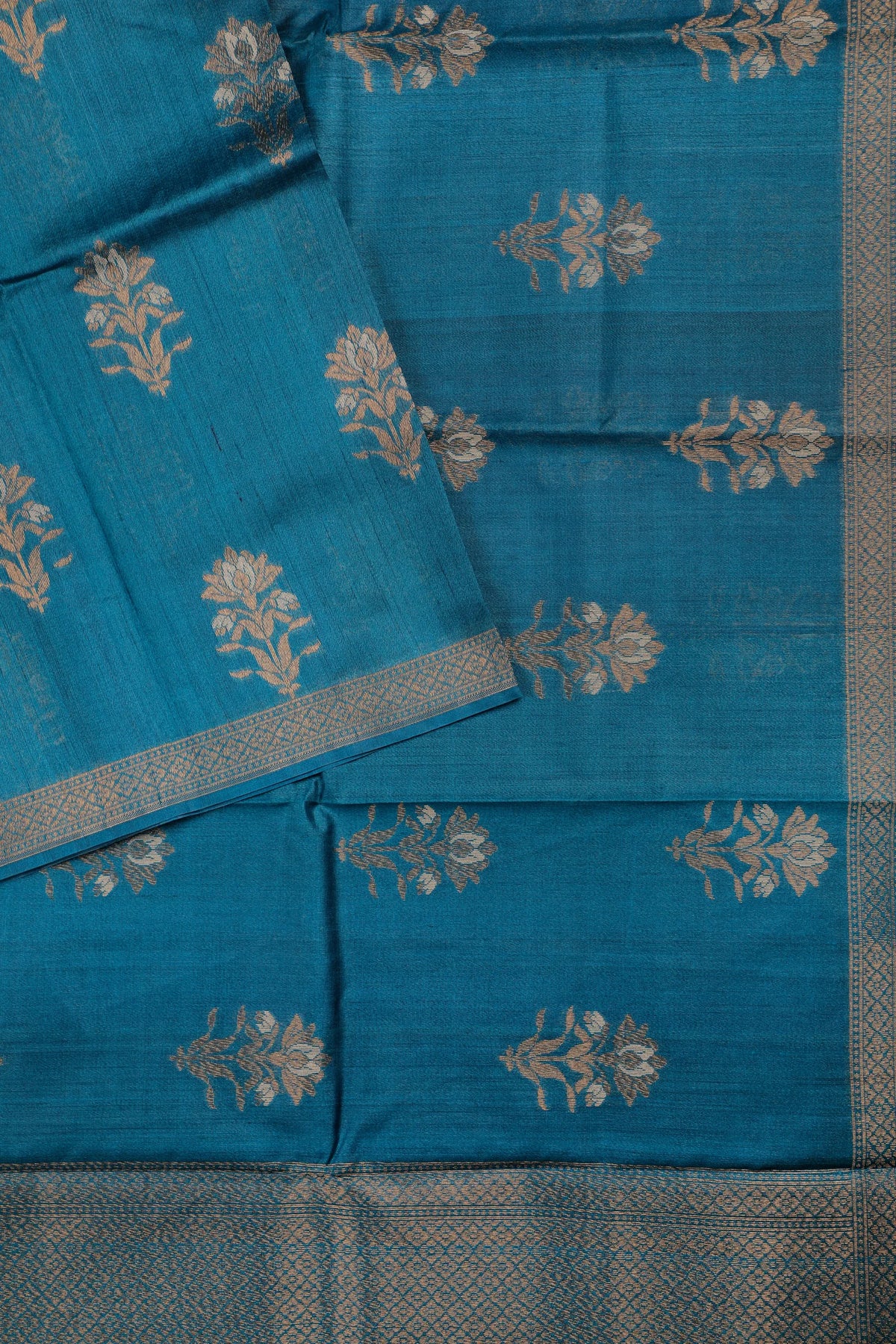 Teal Blue Handloom Raw and Katan Silk Saree with Floral Buttis