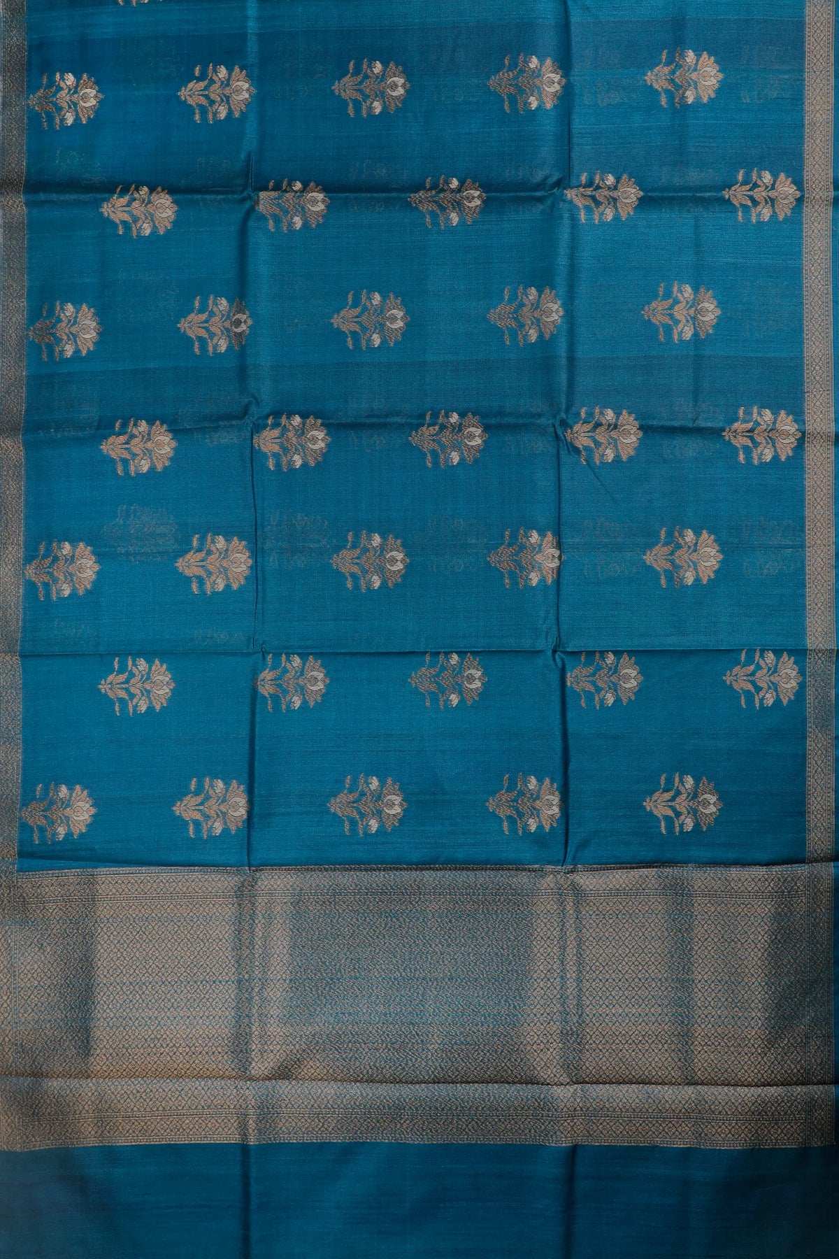 Teal Blue Handloom Raw and Katan Silk Saree with Floral Buttis