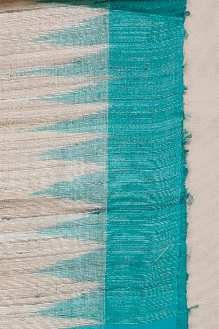 Beige Handloom Tussar Silk Saree with Peacock Blue Temple Border